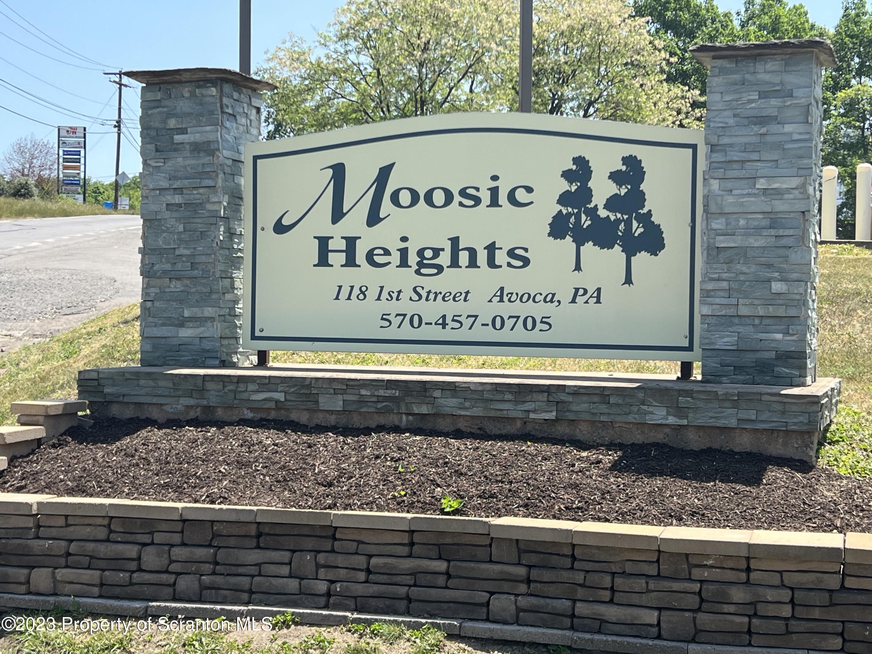 504 5th Street Avoca, PA 18641 - Photo 8 of 8 a sign on the side of a building