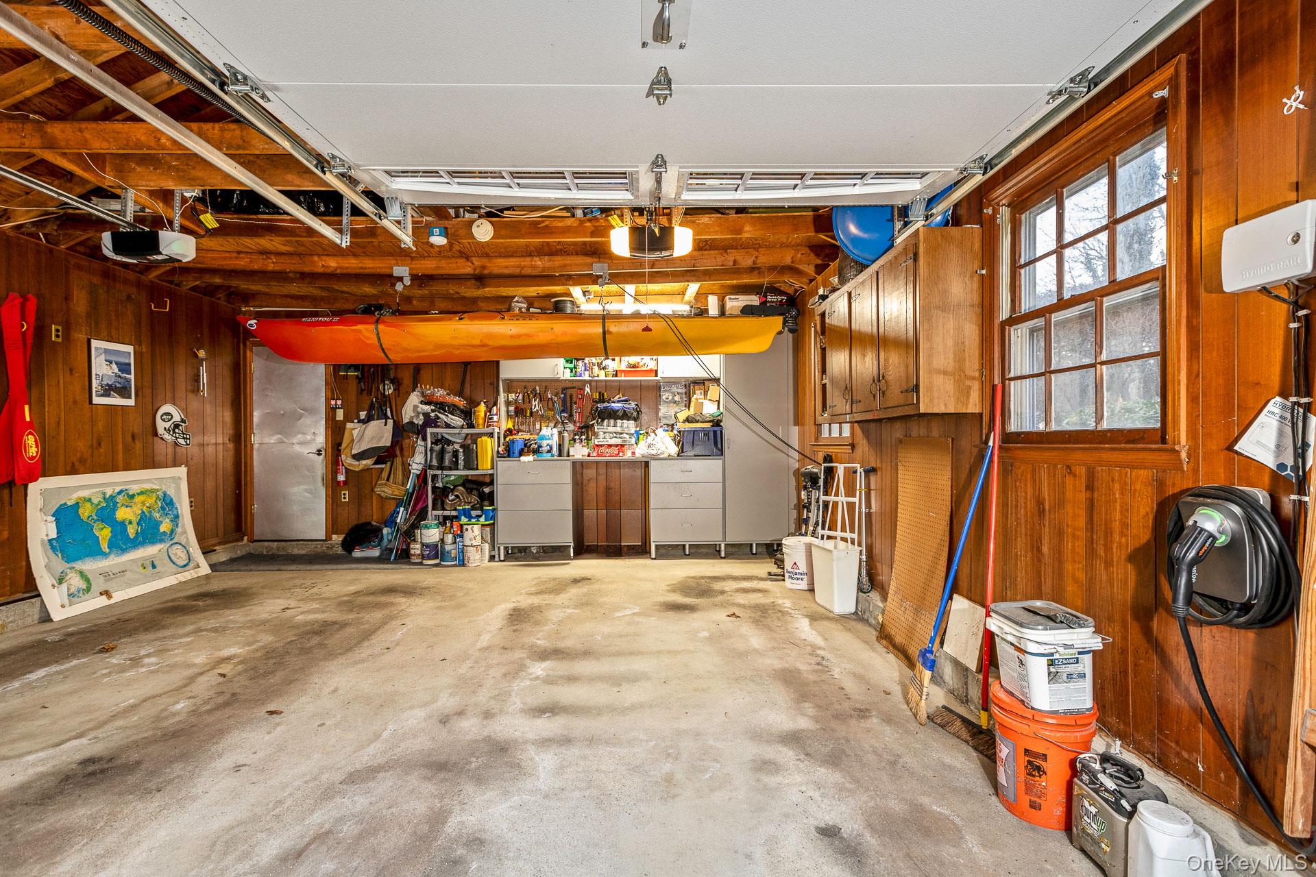 1 Cumberland Path Setauket, NY 11733 - Photo 20 of 29 a view of an empty room with wooden floor