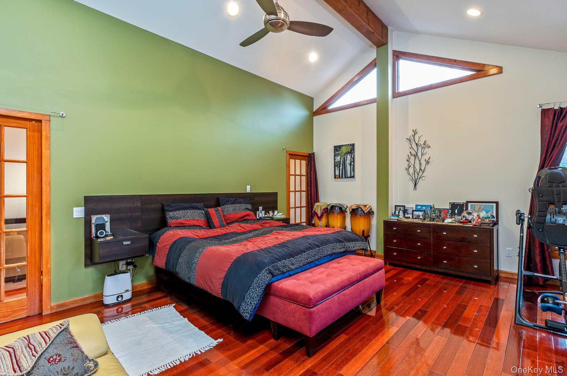 1 Cumberland Path Setauket, NY 11733 - Photo 5 of 29 a bed room with a bed and a dresser