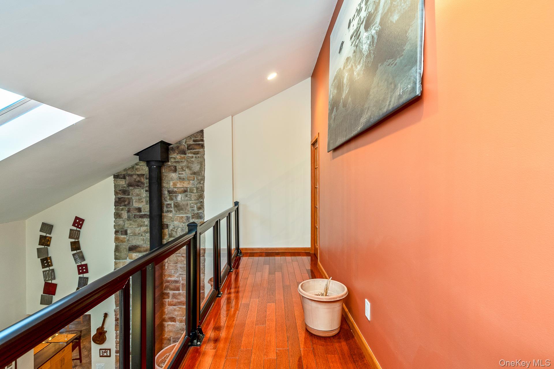 1 Cumberland Path Setauket, NY 11733 - Photo 7 of 29 a bathroom with a toilet sink and mirror