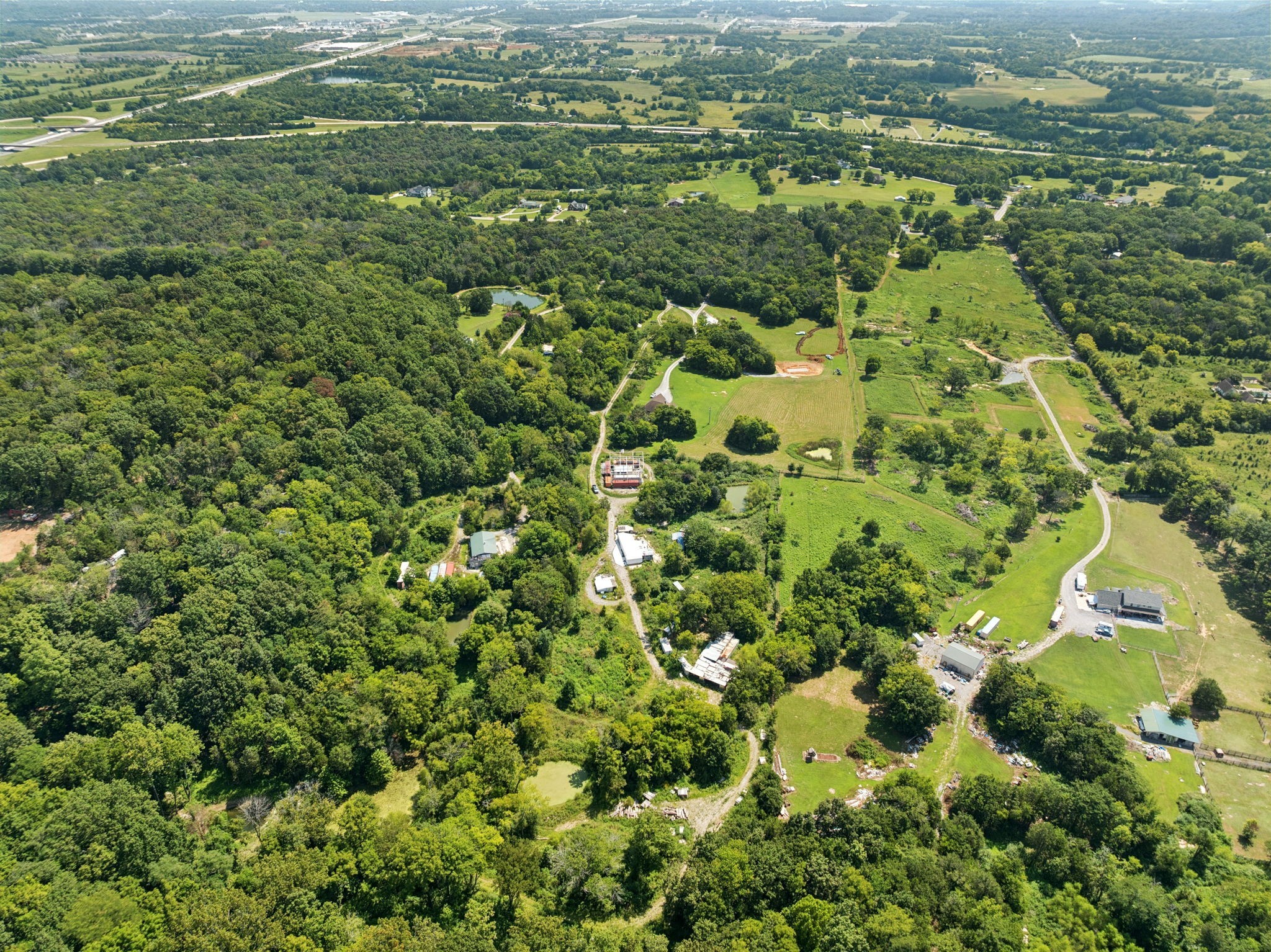 576 Nokes Road Lebanon, TN 37090 - Photo 11 of 11 an aerial view of residential houses with outdoor space and trees