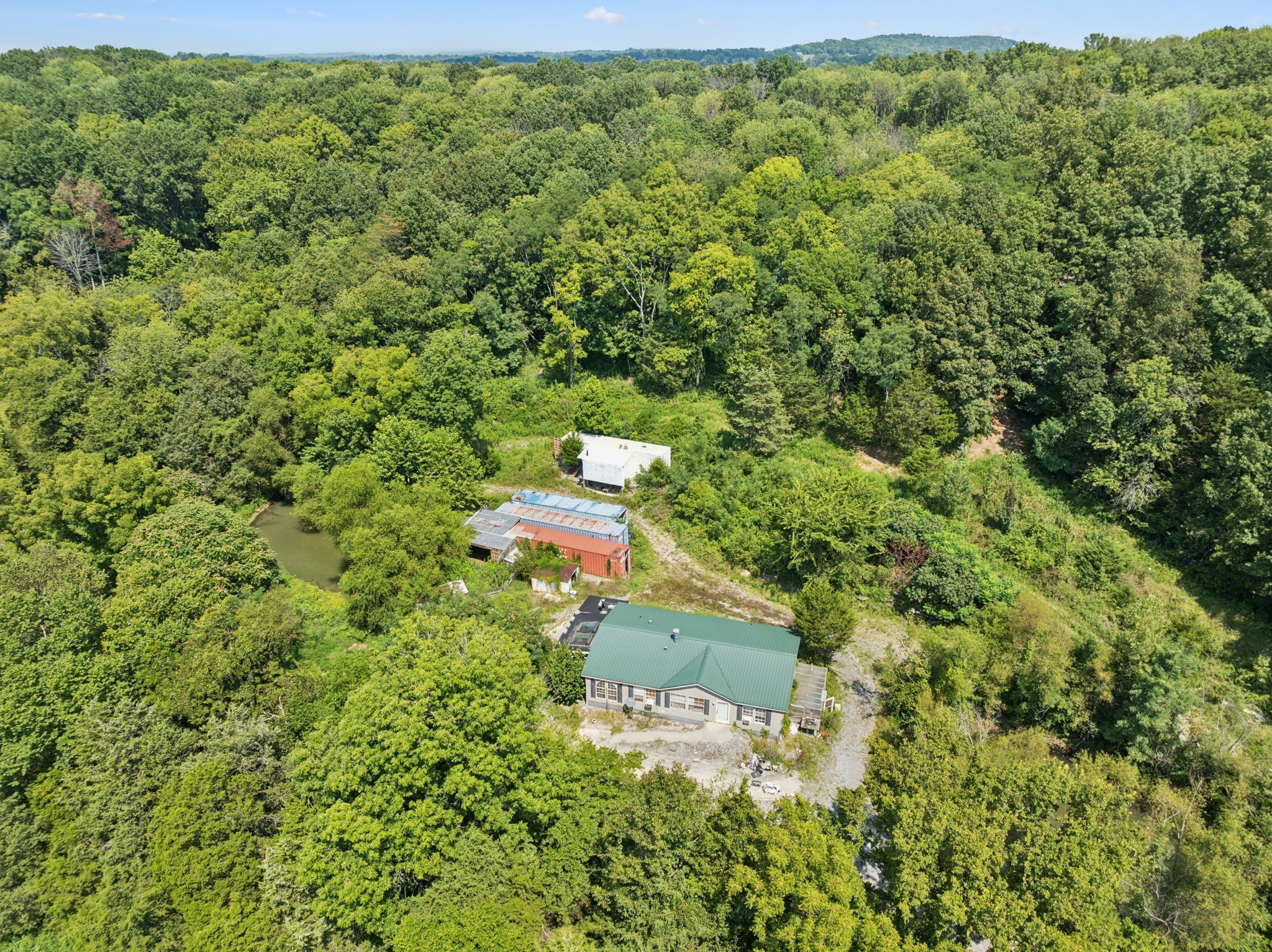 576 Nokes Road Lebanon, TN 37090 - Photo 2 of 11 a view of a house with a yard and trees
