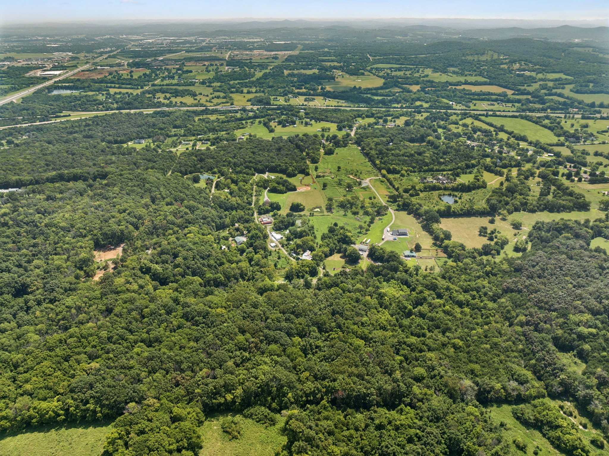 576 Nokes Road Lebanon, TN 37090 - Photo 5 of 11 an aerial view of residential houses with outdoor space and trees