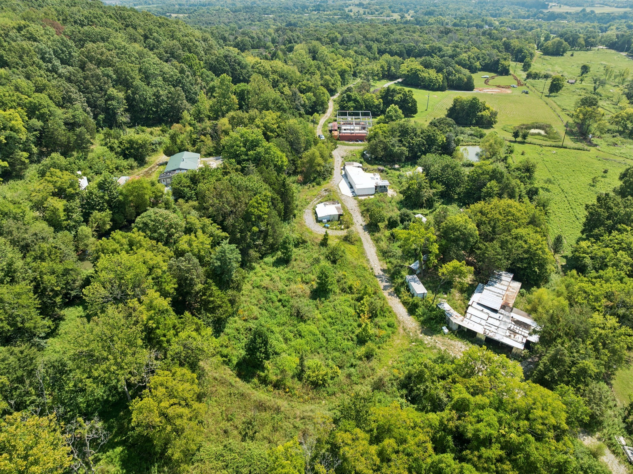 576 Nokes Road Lebanon, TN 37090 - Photo 8 of 11 an aerial view of residential houses with outdoor space and trees