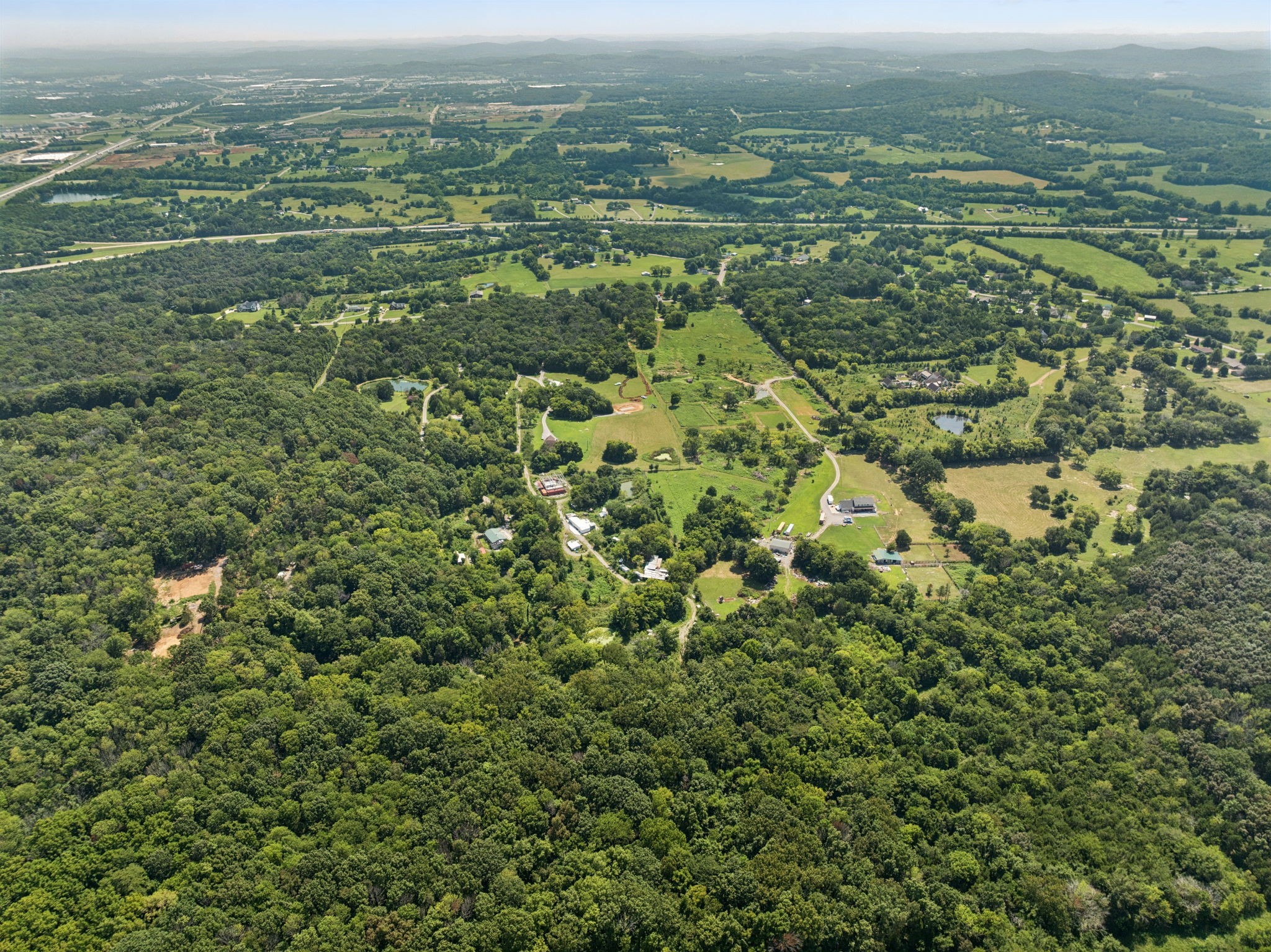 576 Nokes Road Lebanon, TN 37090 - Photo 10 of 11 an aerial view of residential houses with outdoor space and trees