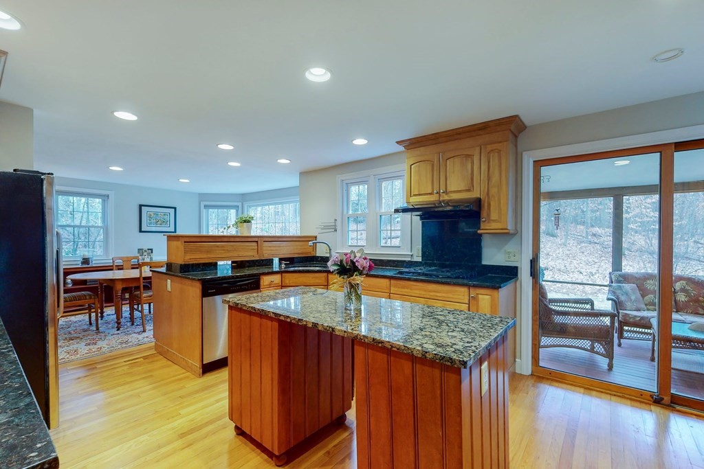 8 Meadowview Road Wayland, MA 01778 - Photo 18 of 40 a kitchen with stainless steel appliances granite countertop sink stove top oven and cabinets