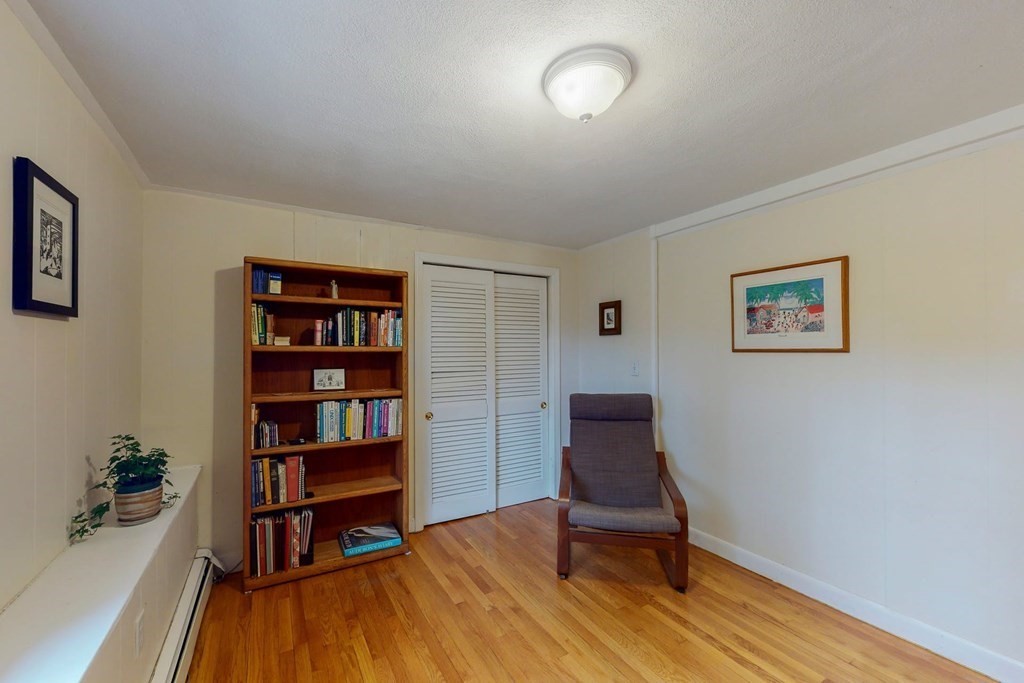 8 Meadowview Road Wayland, MA 01778 - Photo 21 of 40 a view of a workspace with furniture and wooden floor