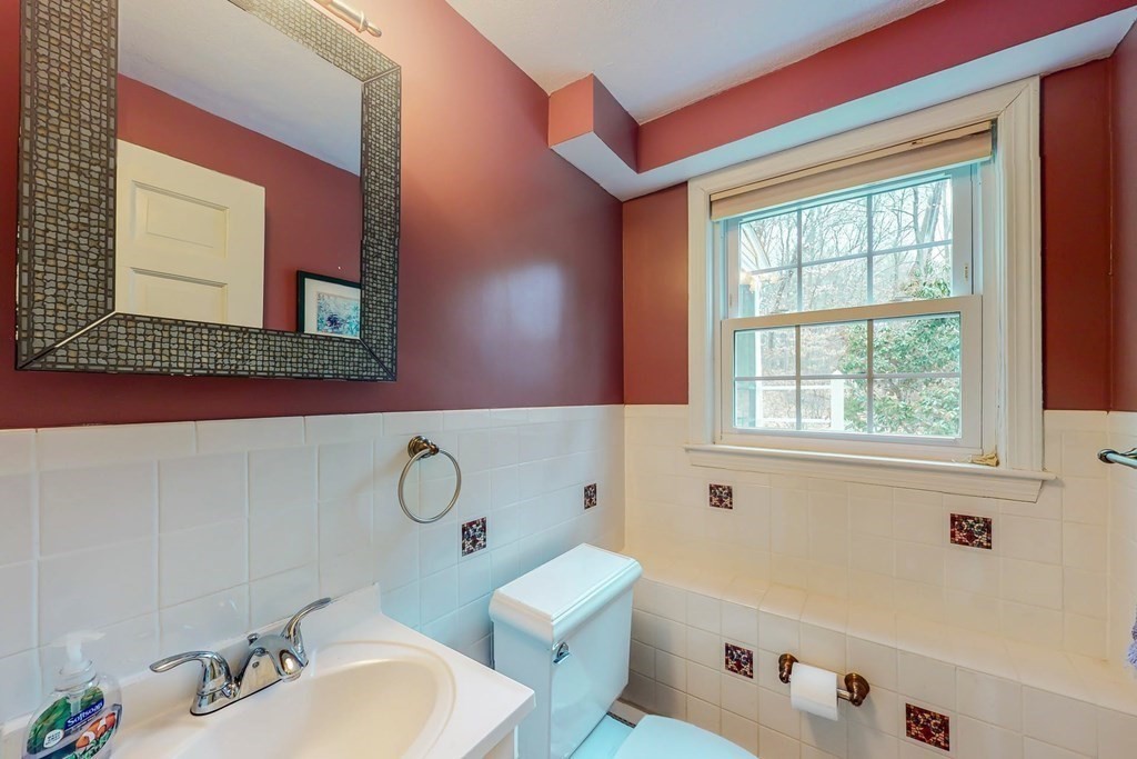 8 Meadowview Road Wayland, MA 01778 - Photo 23 of 40 a bathroom with a sink and a mirror