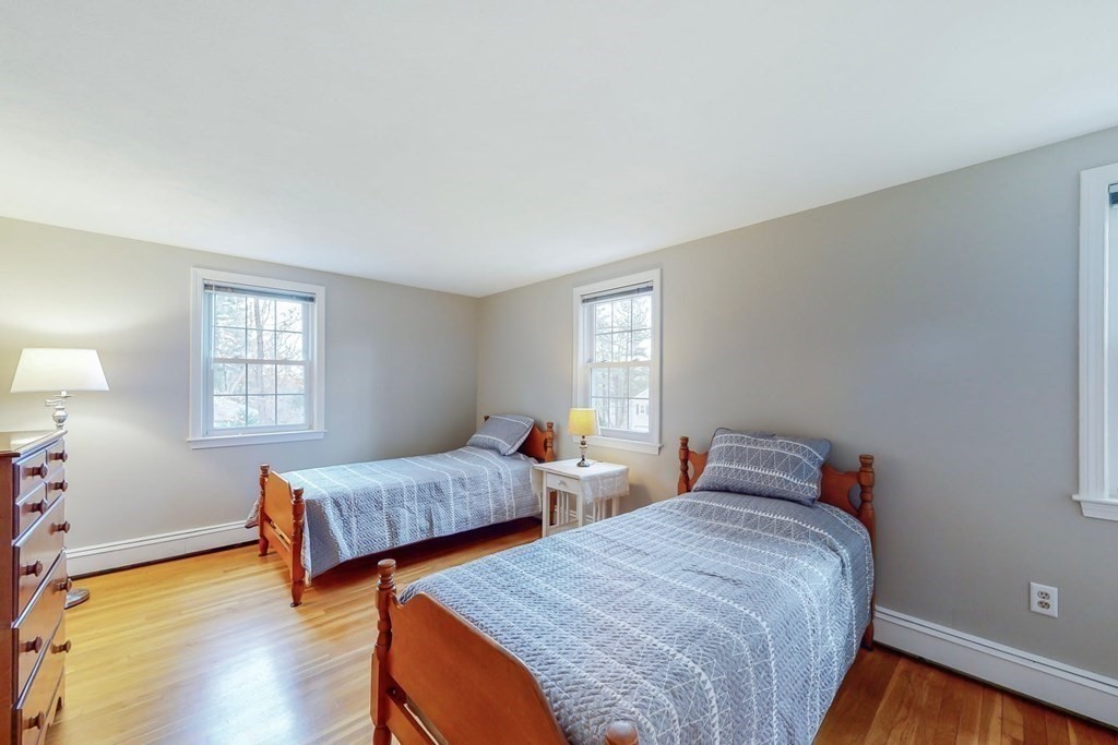 8 Meadowview Road Wayland, MA 01778 - Photo 26 of 40 a bedroom with two beds and a window