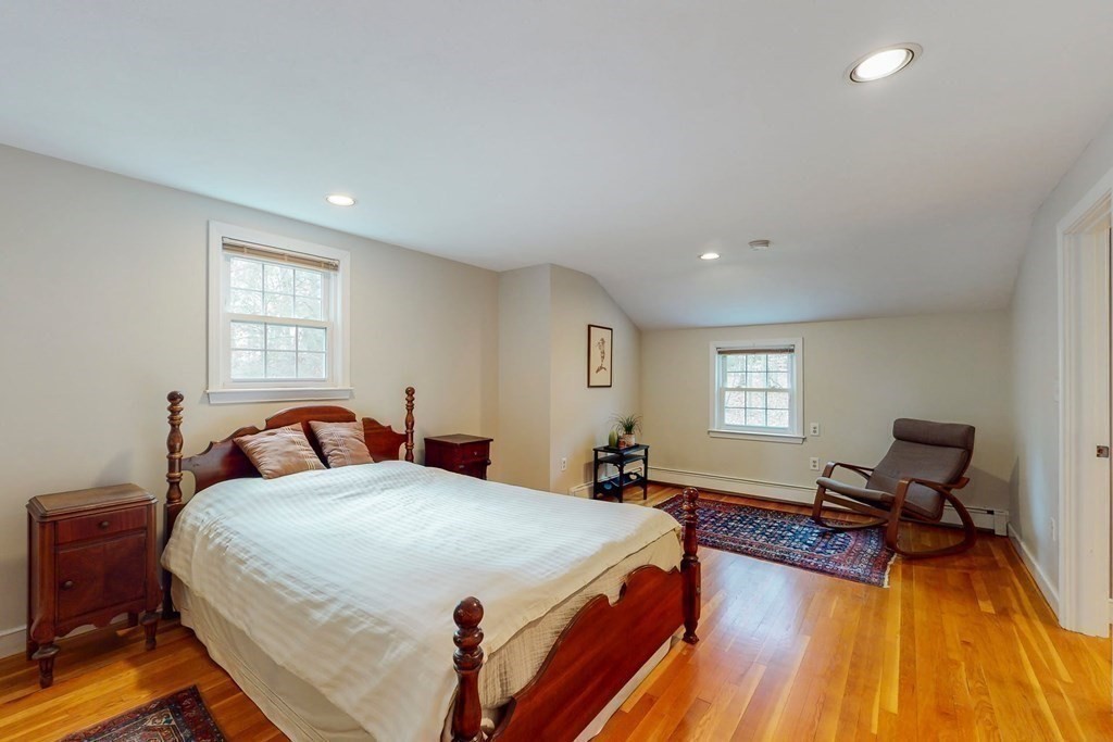 8 Meadowview Road Wayland, MA 01778 - Photo 32 of 40 a bed room with two bed and a chair