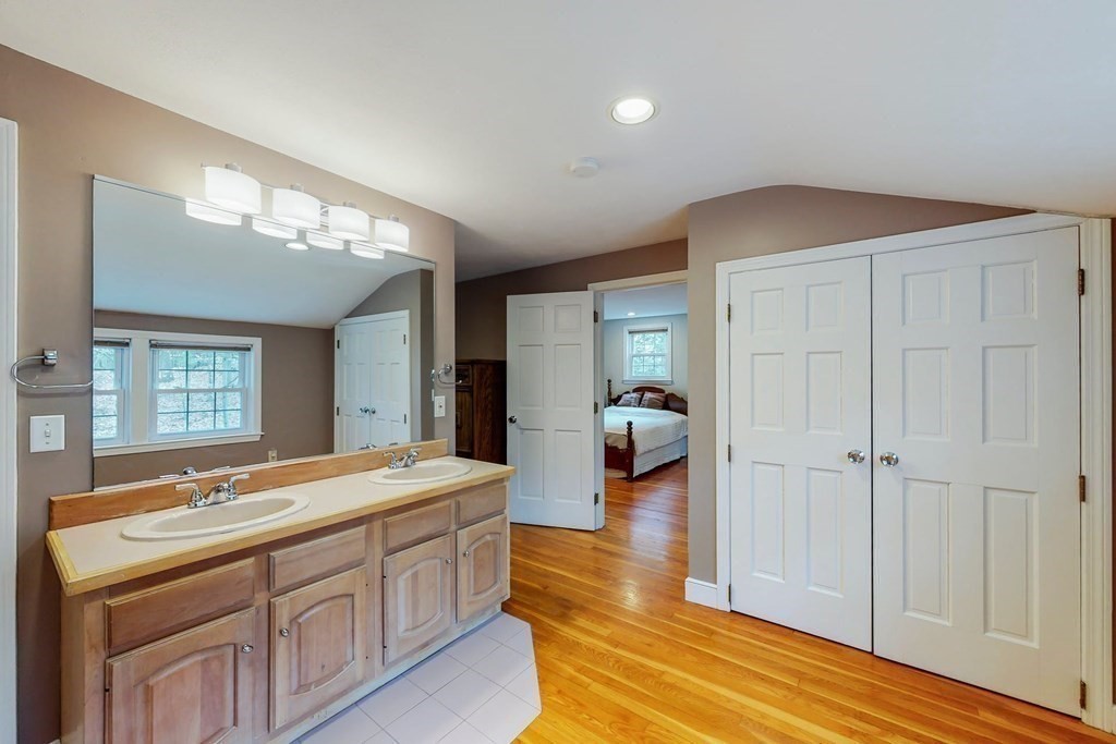 8 Meadowview Road Wayland, MA 01778 - Photo 35 of 40 a spacious bathroom with a sink and a mirror