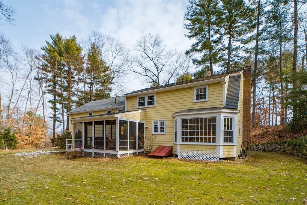 8 Meadowview Road Wayland, MA 01778 - Photo 6 of 40 a view of a house with a yard deck and a large tree