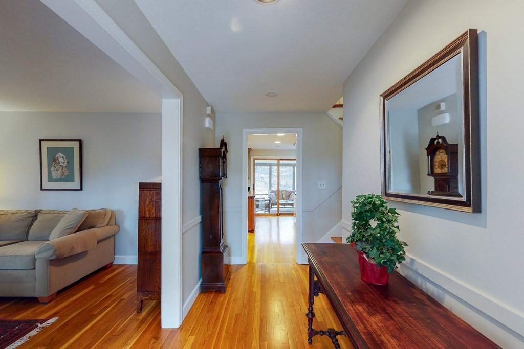 8 Meadowview Road Wayland, MA 01778 - Photo 10 of 40 a living room with furniture and a potted plant