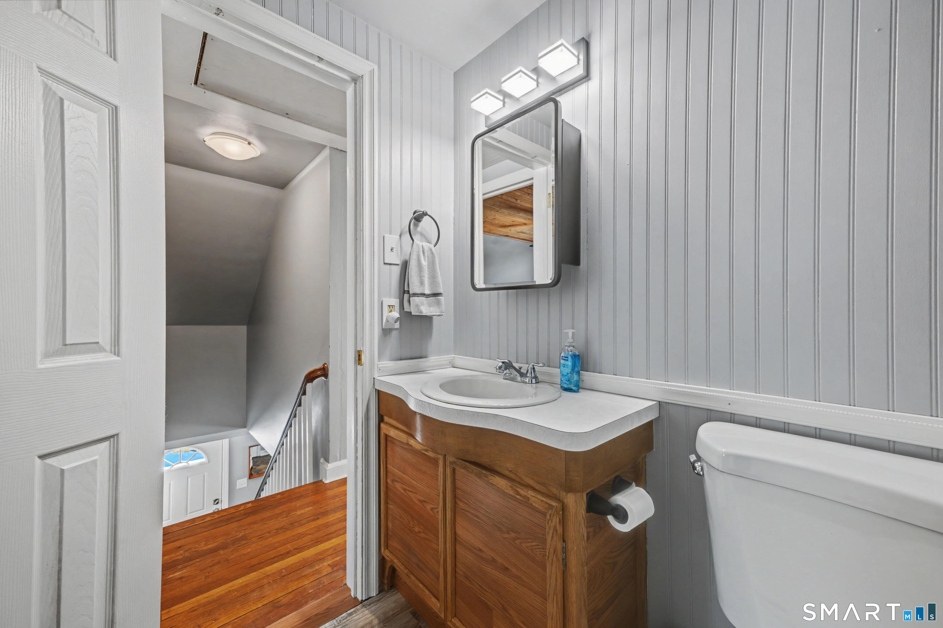 101 Pool Road North Haven, CT 06473 - Photo 15 of 37 a bathroom with a sink a toilet and mirror