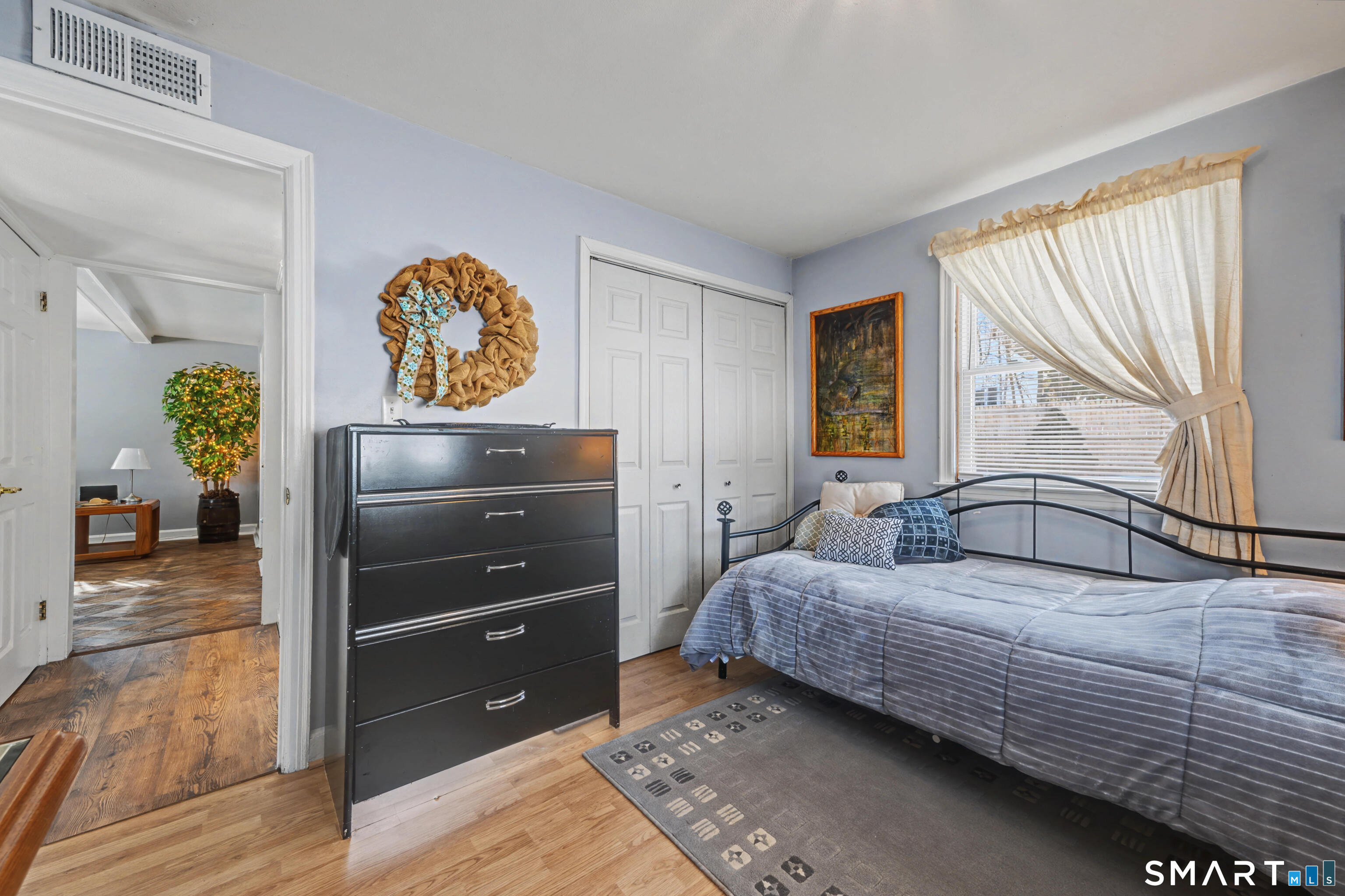 101 Pool Road North Haven, CT 06473 - Photo 17 of 37 a bedroom with a bed and a dresser