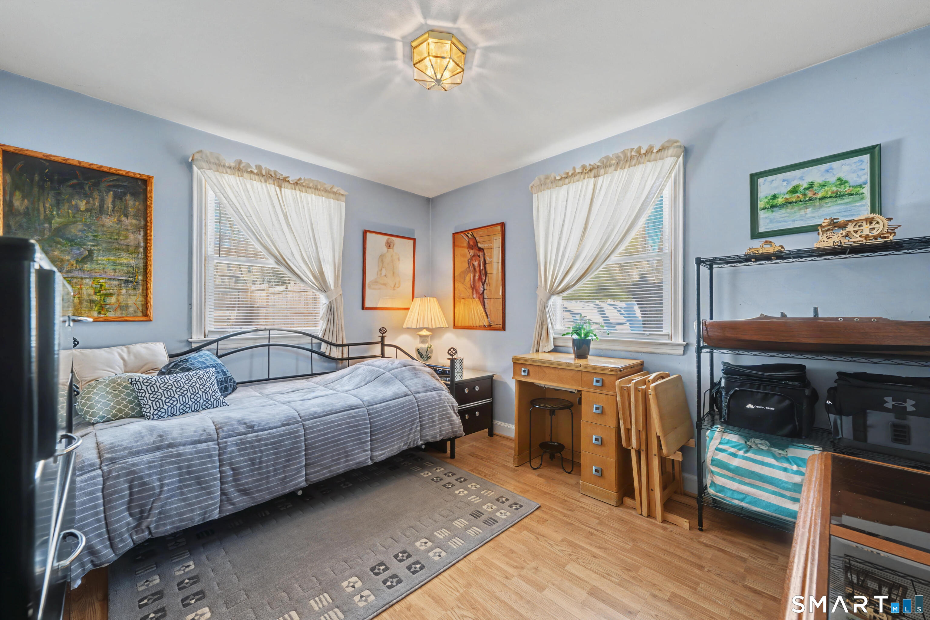 101 Pool Road North Haven, CT 06473 - Photo 19 of 37 a bedroom with a bed and a couch