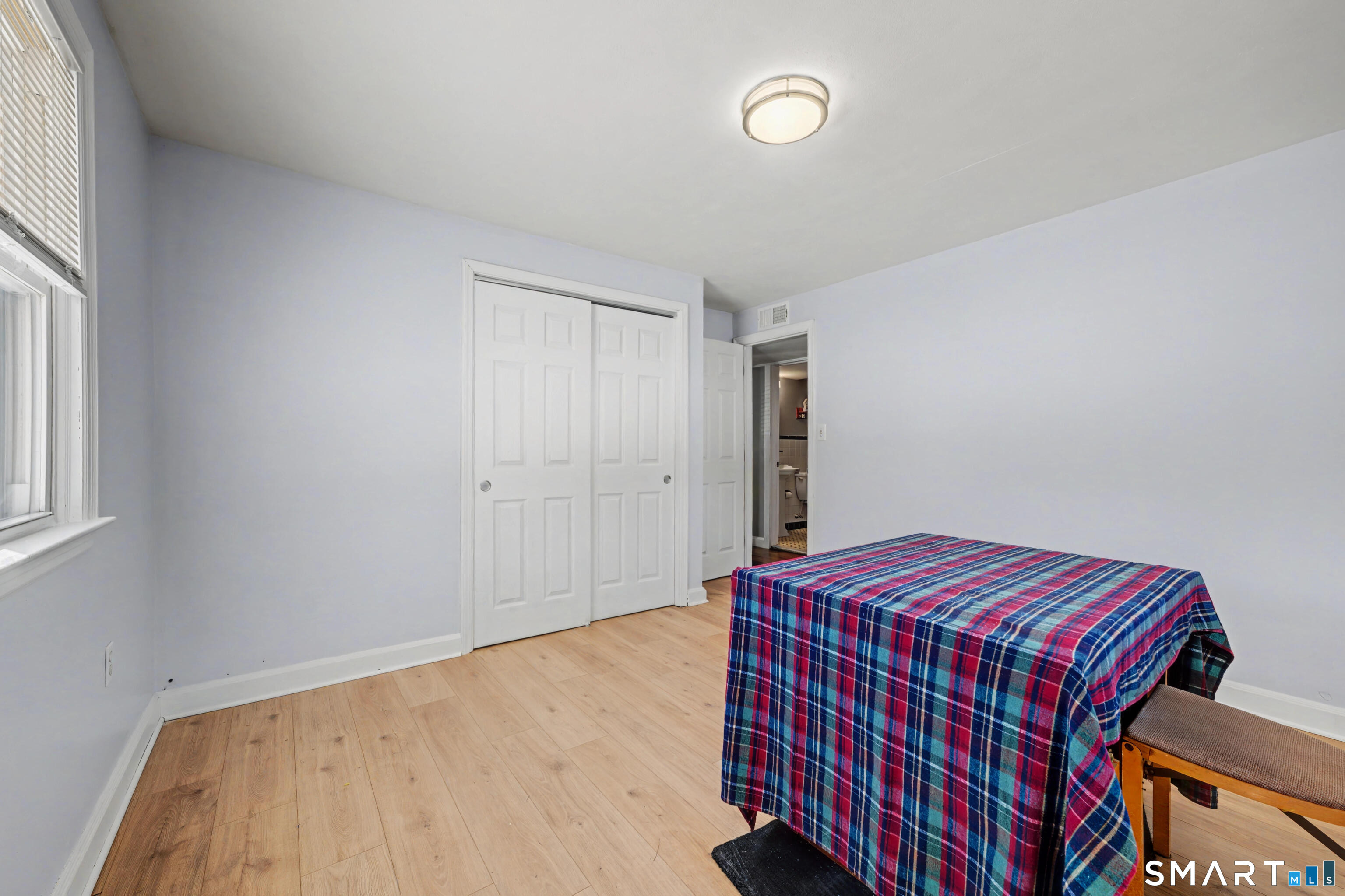 101 Pool Road North Haven, CT 06473 - Photo 22 of 37 a bedroom with a bed and a window