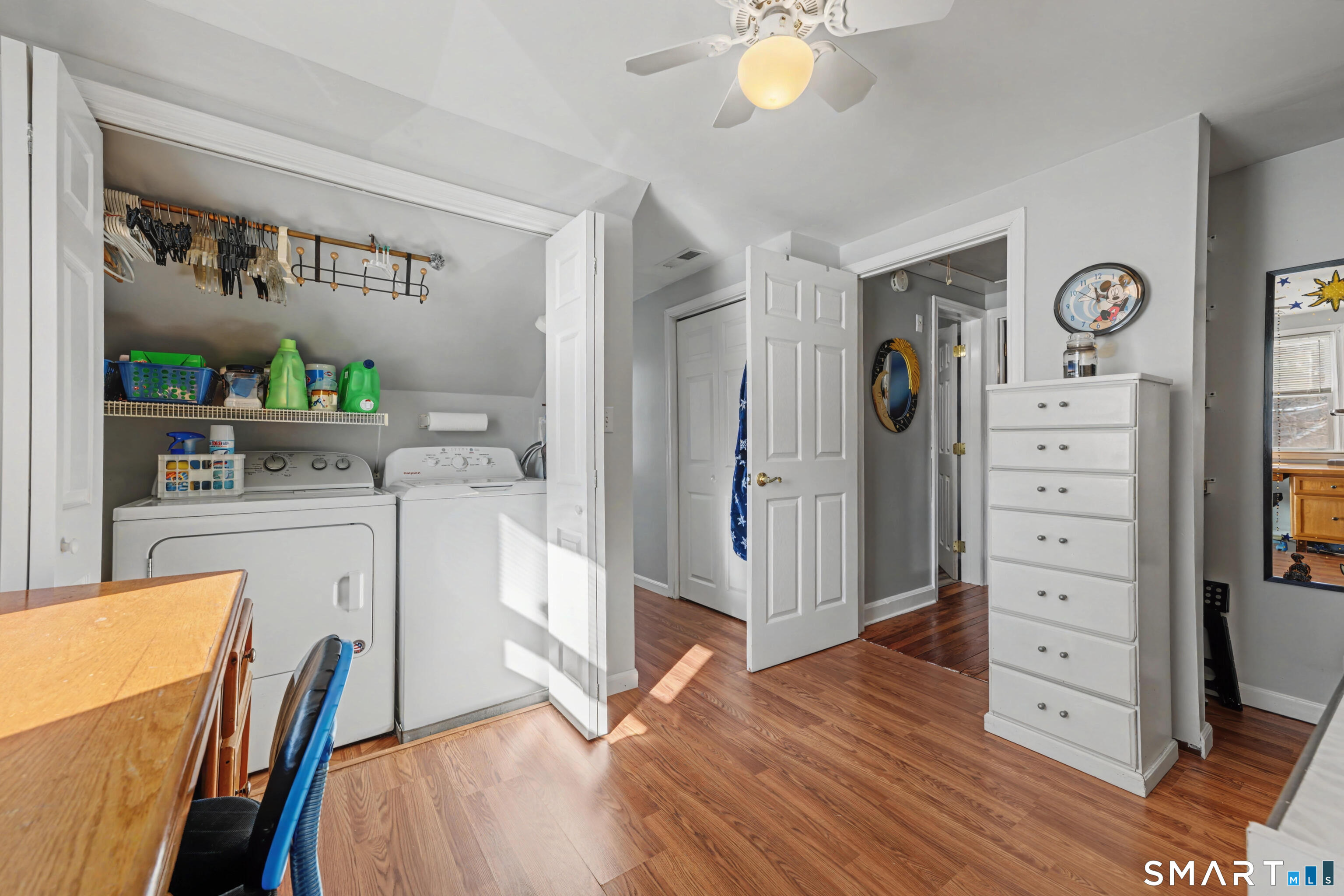 101 Pool Road North Haven, CT 06473 - Photo 28 of 37 a living room with furniture and a wooden floor