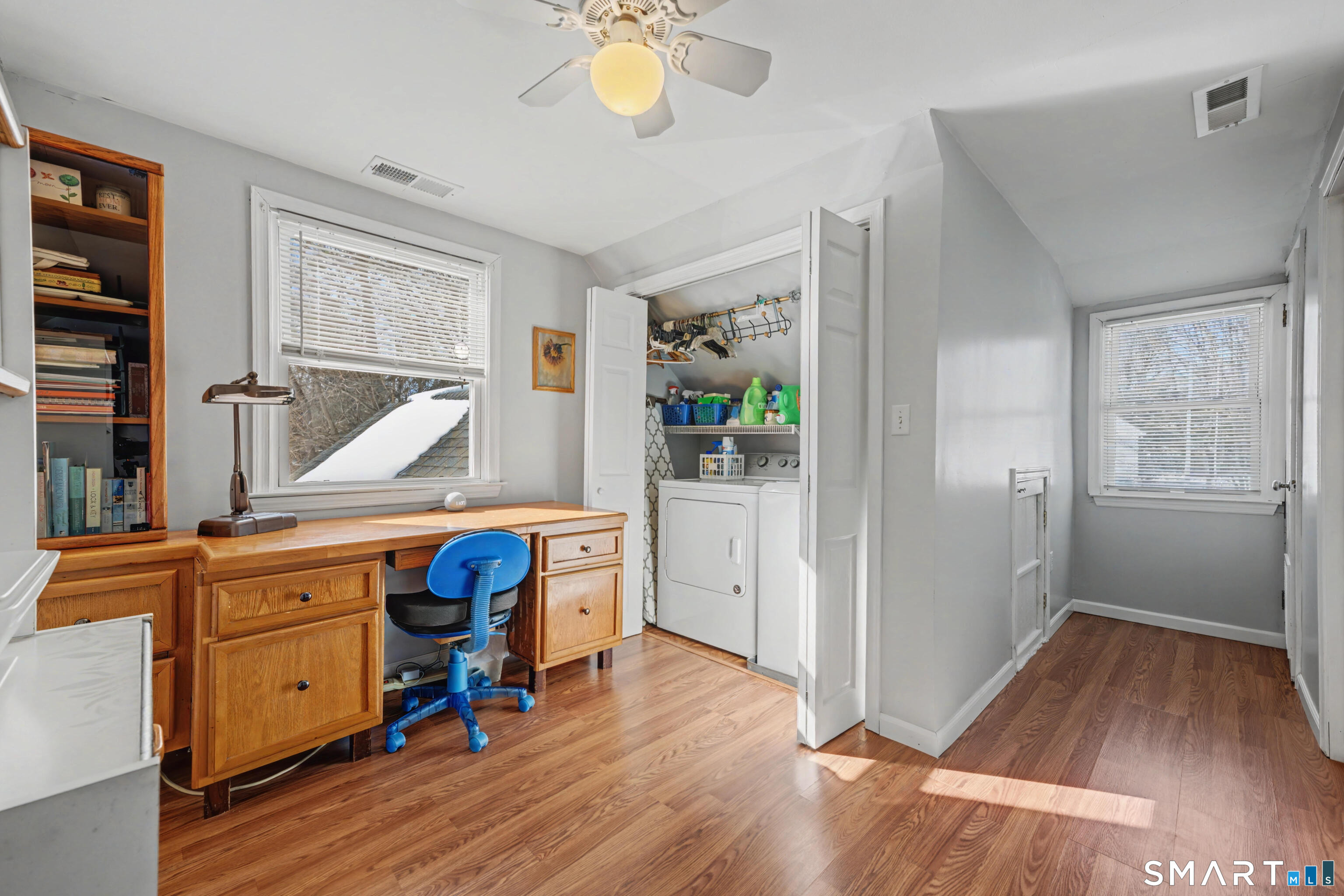 101 Pool Road North Haven, CT 06473 - Photo 29 of 37 a view of an empty room with window and wooden floor
