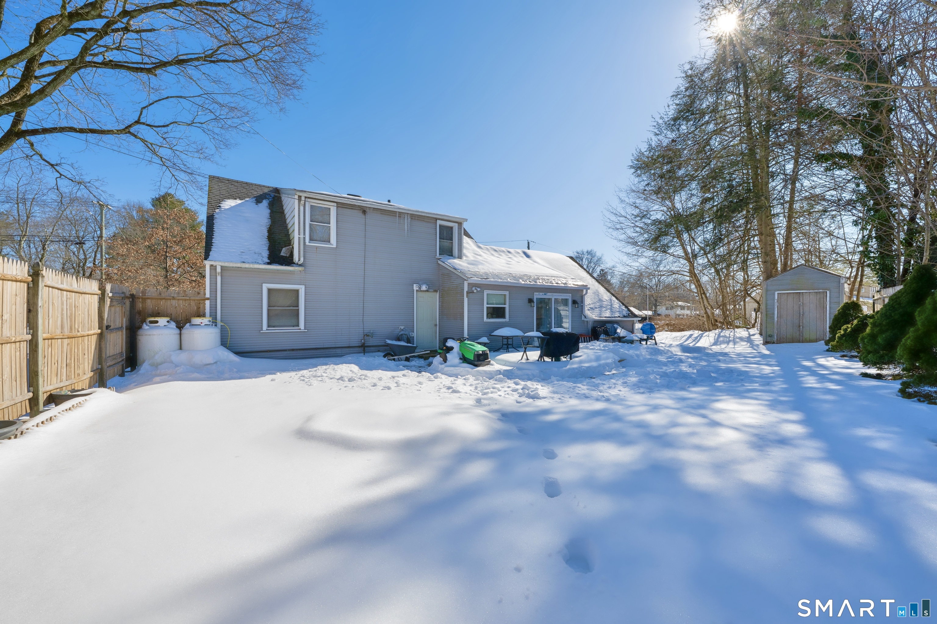 101 Pool Road North Haven, CT 06473 - Photo 35 of 37 a view of a house with backyard and a tree