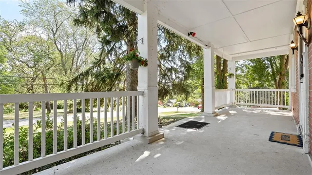 a view of a porch with backyard