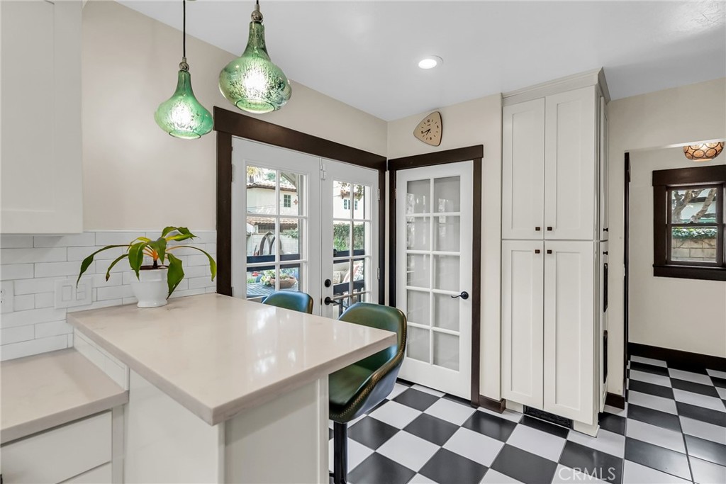 4465 5th Street Riverside, CA 92501 - Photo 15 of 56 a view of a dining table and chairs