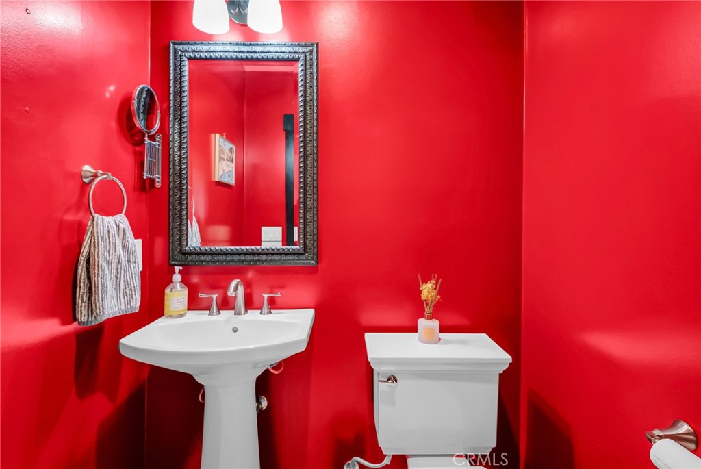 4465 5th Street Riverside, CA 92501 - Photo 21 of 56 a bathroom with a sink and mirror