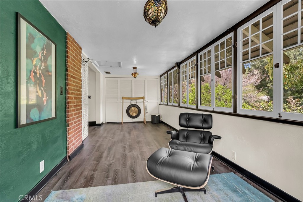 4465 5th Street Riverside, CA 92501 - Photo 32 of 56 a living room with furniture and a large window