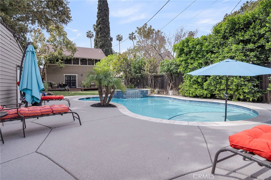 4465 5th Street Riverside, CA 92501 - Photo 37 of 56 an outdoor space with patio and white umbrellas