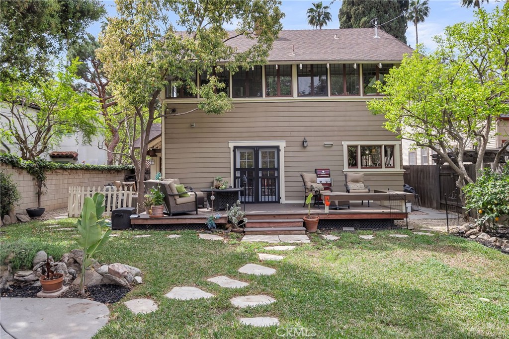 4465 5th Street Riverside, CA 92501 - Photo 39 of 56 a view of a house with backyard sitting area and swimming pool