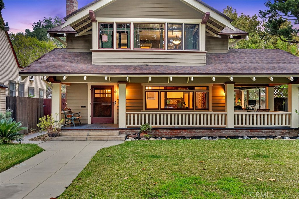 4465 5th Street Riverside, CA 92501 - Photo 43 of 56 a front view of a house with a garden
