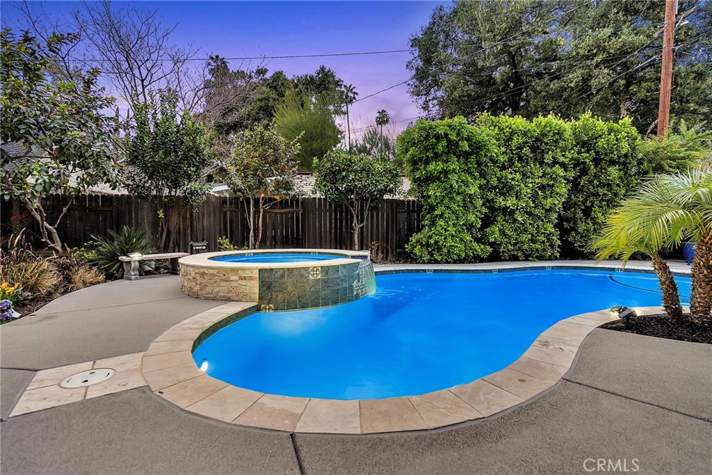 4465 5th Street Riverside, CA 92501 - Photo 50 of 56 a view of a swimming pool with an outdoor seating and yard