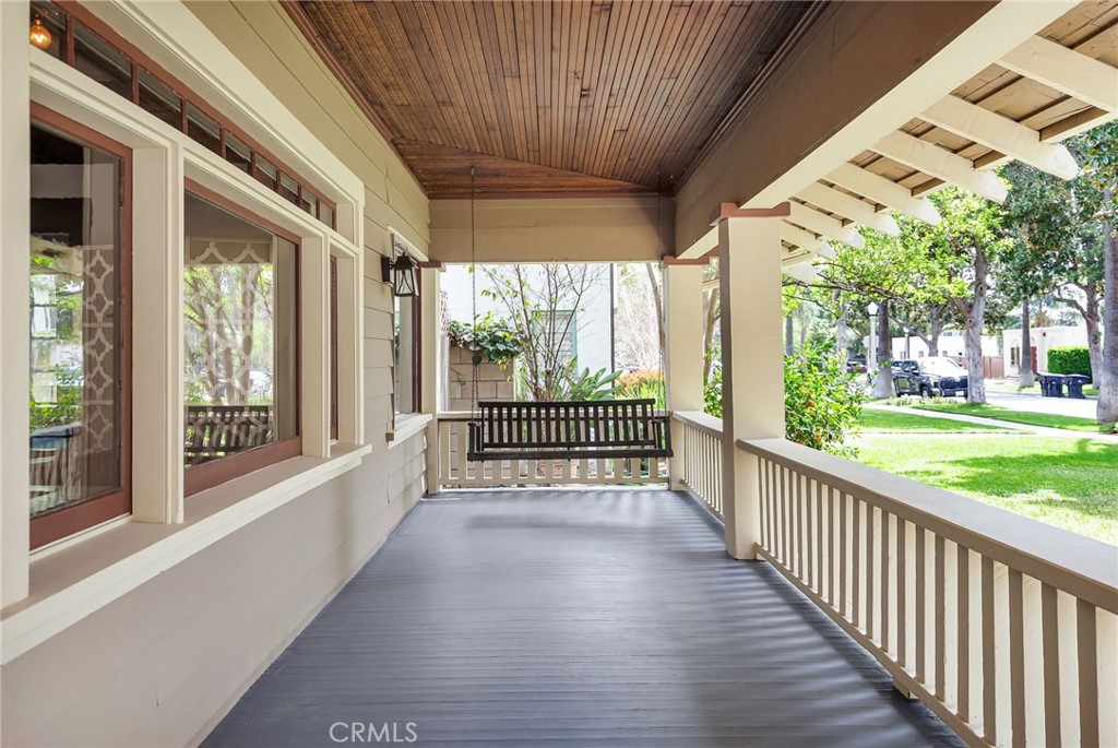 4465 5th Street Riverside, CA 92501 - Photo 5 of 56 a view of a porch with wooden floor and stairs
