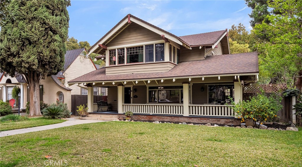 4465 5th Street Riverside, CA 92501 - Photo 53 of 56 a front view of a house with a garden