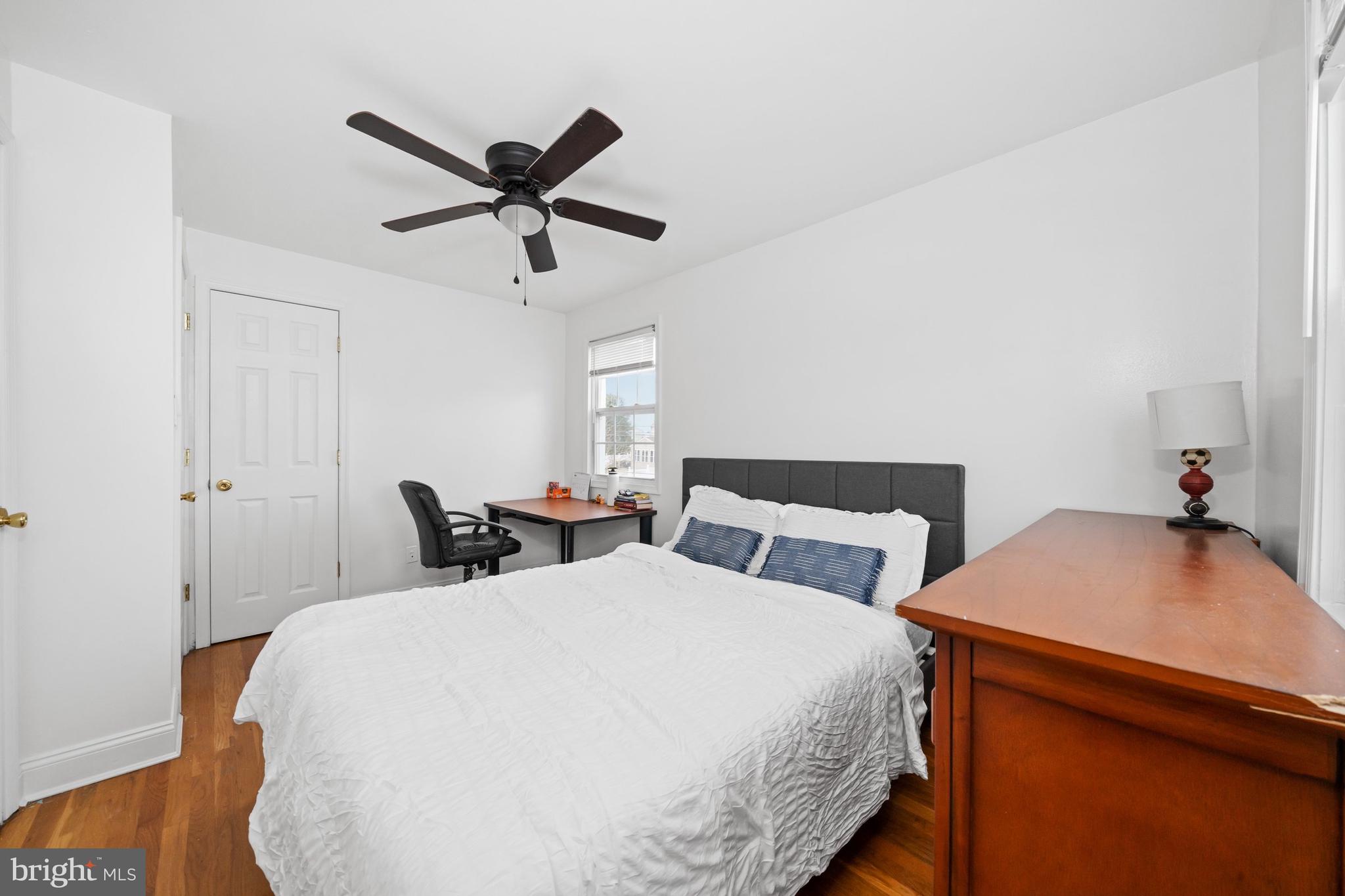 18 George Read Road New Castle, DE 19720 - Photo 27 of 40 a bedroom with two separate beds and a chandelier