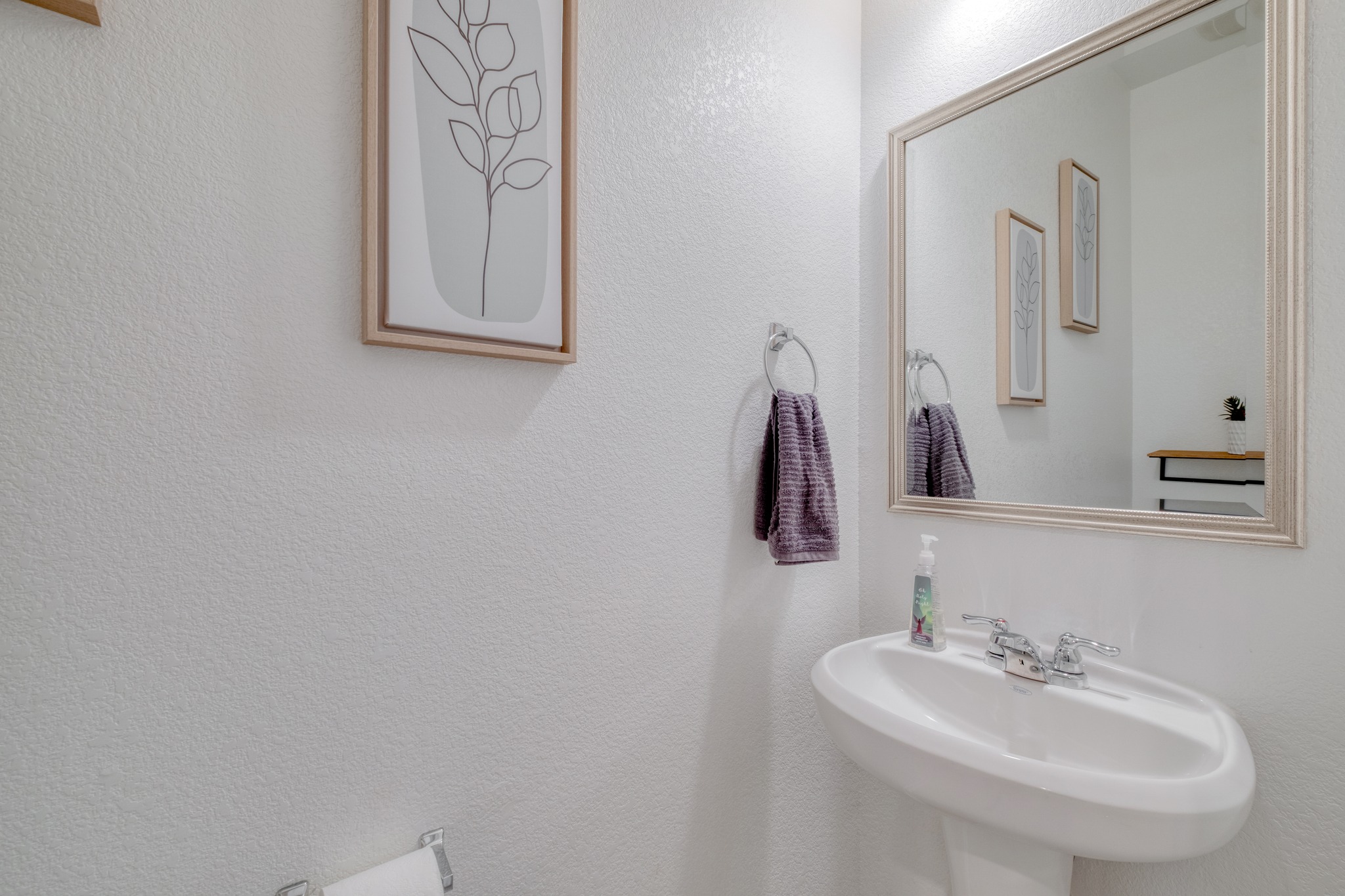508 Barbary Coast Lane Jarrell, TX 76537 - Photo 11 of 27 a bathroom with a sink and a mirror