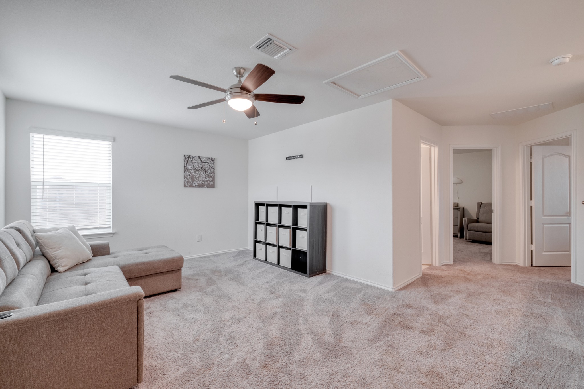 508 Barbary Coast Lane Jarrell, TX 76537 - Photo 13 of 27 a living room with furniture and a ceiling fan