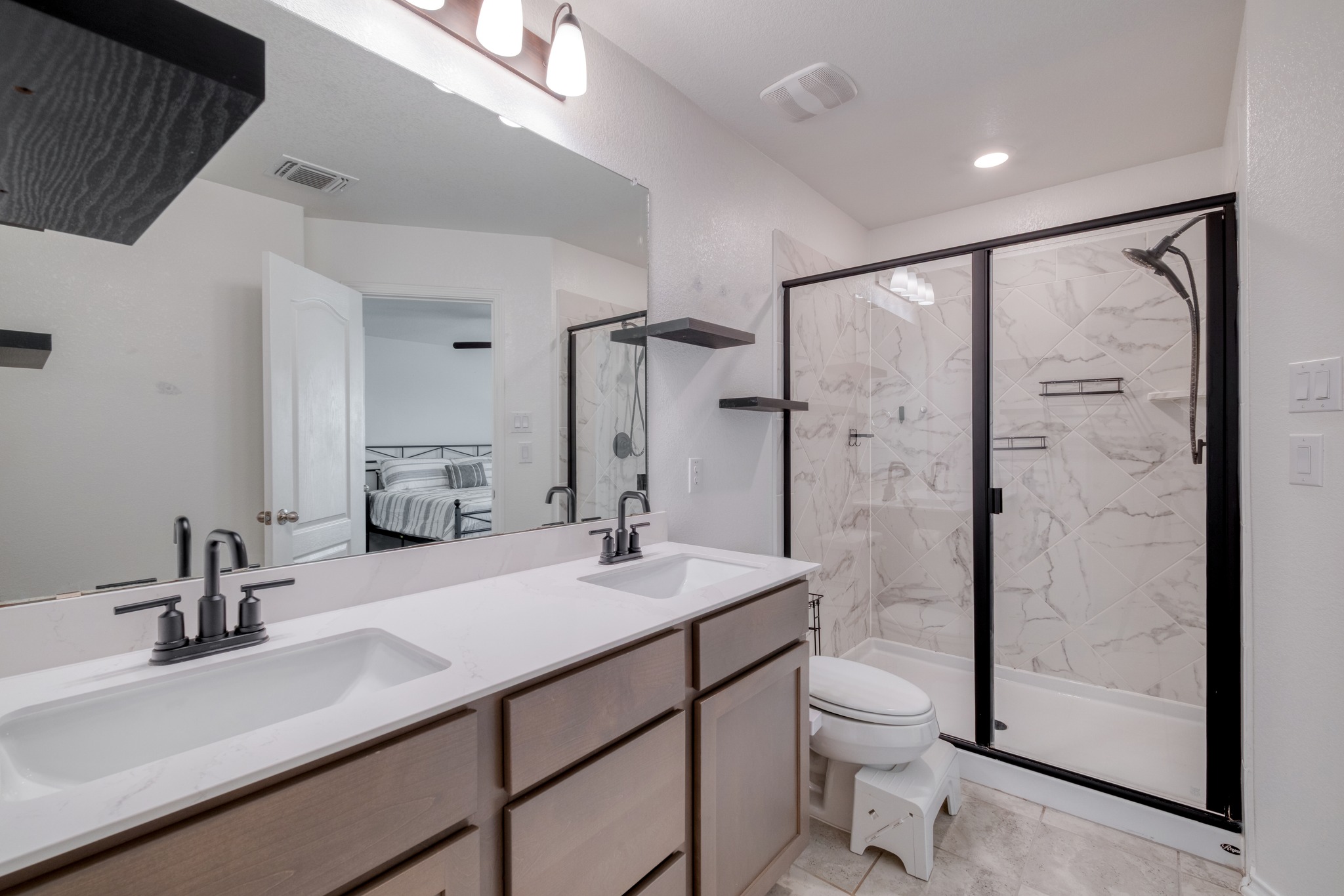508 Barbary Coast Lane Jarrell, TX 76537 - Photo 18 of 27 a bathroom with a sink a toilet and shower