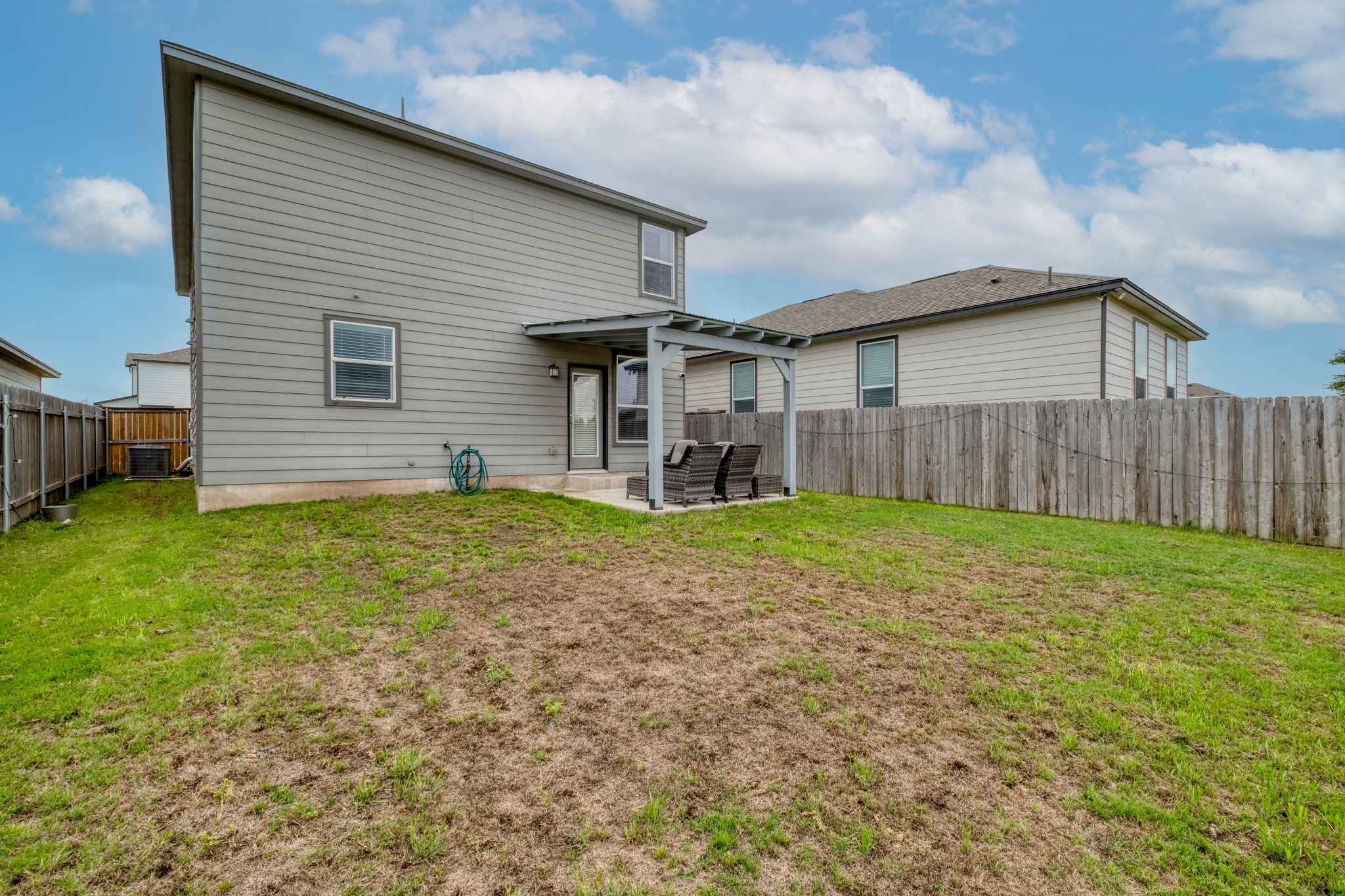 508 Barbary Coast Lane Jarrell, TX 76537 - Photo 24 of 27 a house view with a backyard space
