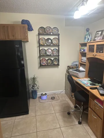 a workspace with furniture and wooden floor