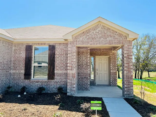 a view of a house with a patio