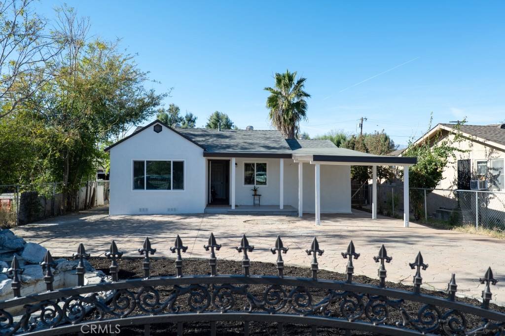 3635 Wallace Street Riverside, CA 92509 - Photo 1 of 1 a front view of house with a garden