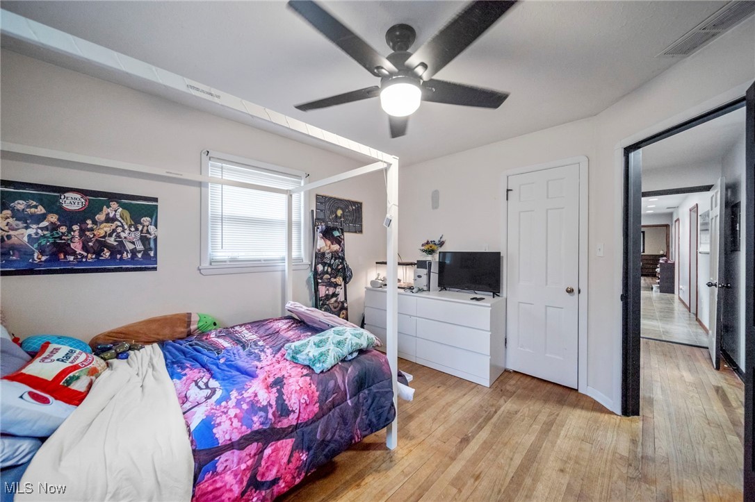 6600 Reynolds Road Mentor, OH 44060 - Photo 20 of 35 Bedroom featuring ceiling fan and light wood-type flooring