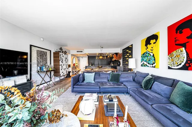 a spacious bedroom with a bed and a window