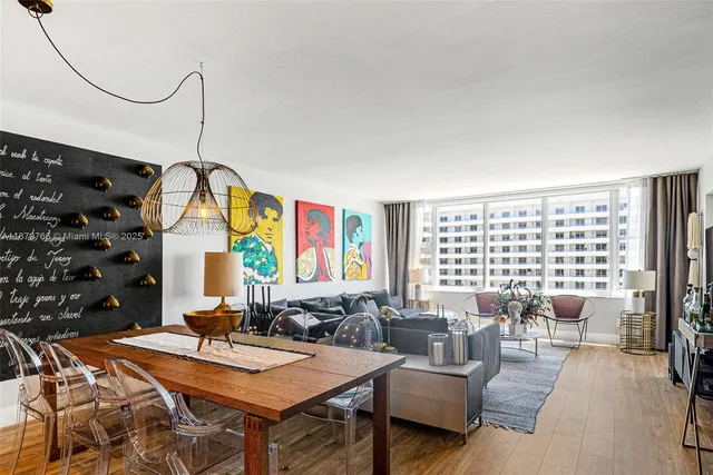 a kitchen with a table and chairs in it