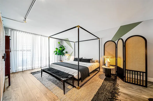 a bathroom with a granite countertop double vanity sinks and a mirror