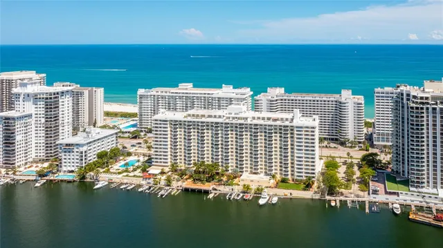 a view of a swimming pool with a table and chair