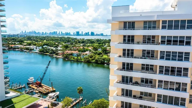 a view of swimming pool with outdoor seating