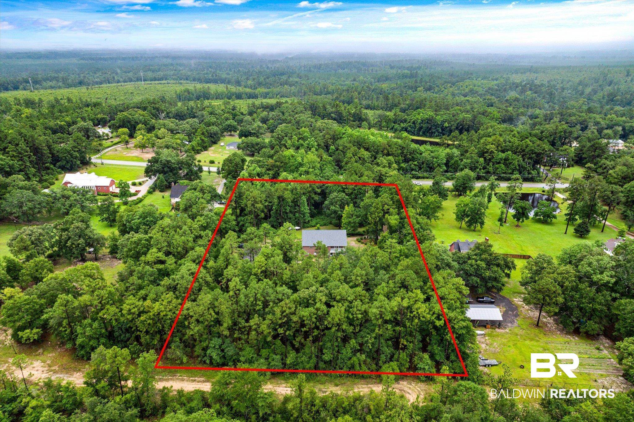 2300 Radcliff Road Saraland, AL 36571 - Photo 52 of 56 Aerial overview of property's location with a heavily wooded area and property boundaries highlighted