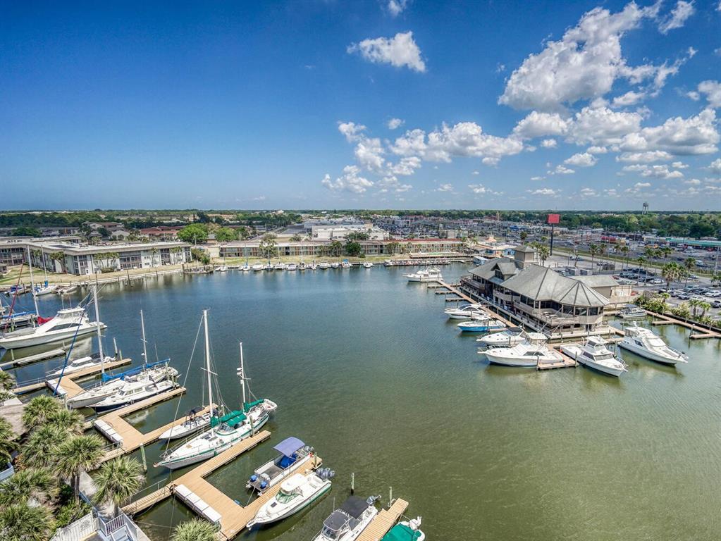 4939 Floramar Terrace, Unit 904 New Port Richey, FL 34652 - Photo 17 of 53 a view of a ocean with residential buildings in ocean